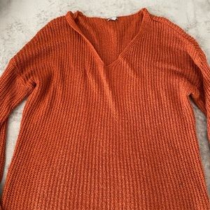 Orange knit sweater